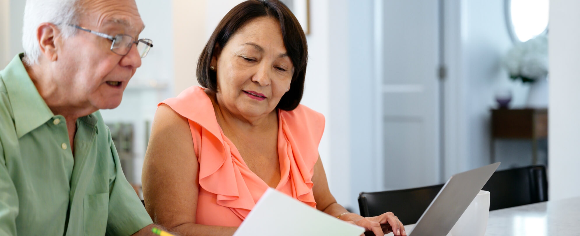 Senior couple reviewing important paperwork 