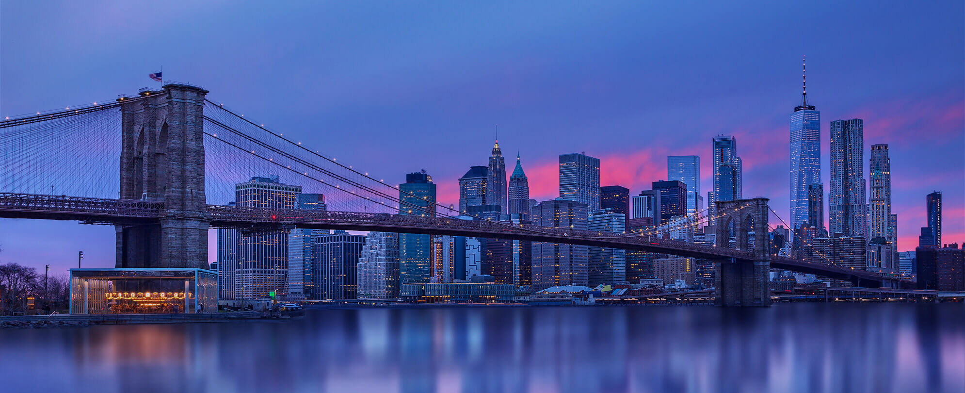 The Brooklyn Bridge and New York skyline at night 
